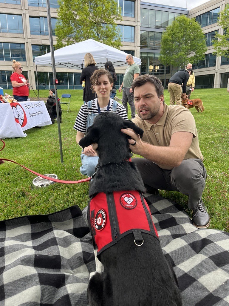 Employees step away from their desks and enjoy Pet Therapy!