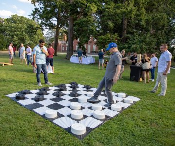 Employees playing lawn games at Gore Mansion 