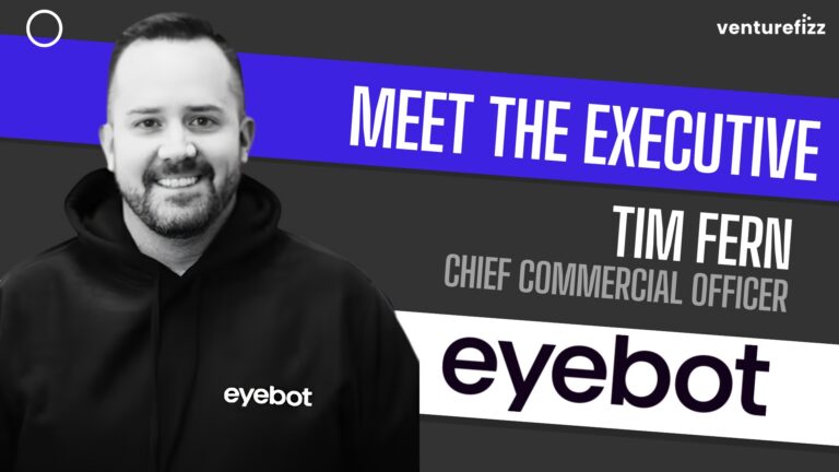 Portrait of Tim Fern, Chief Commercial Officer, smiling in a black hoodie with the eyobot logo, against a bold 'Meet the Executive' banner背景.